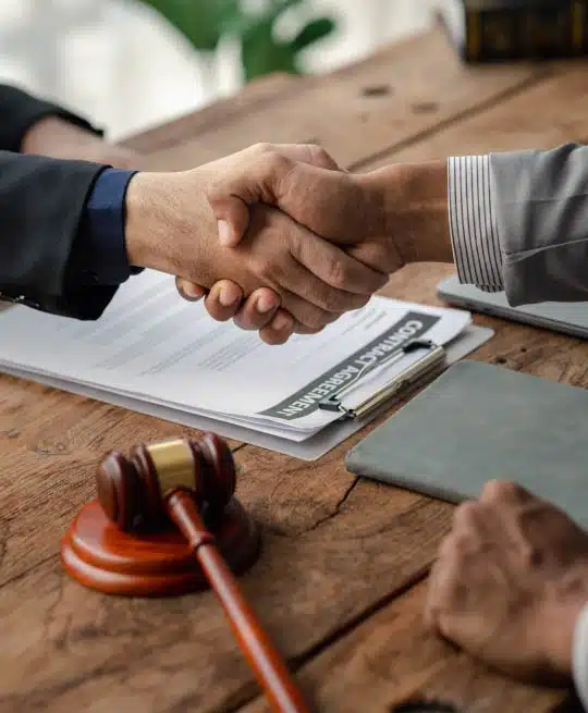 lawyer and client shake hands