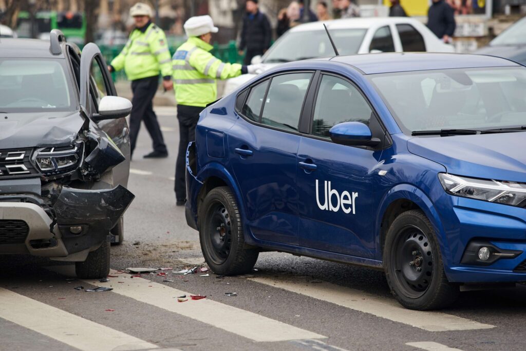 Close-up of a Uber  rideshare vehicle in West Palm Beach representing Uber and Lyft accident cases involving injured passengers and drivers