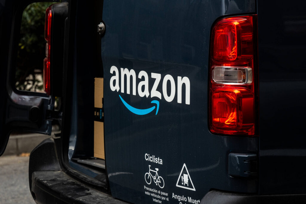 Open back door of an Amazon delivery van detailing Amazon truck accident settlements in Florida what to expect.